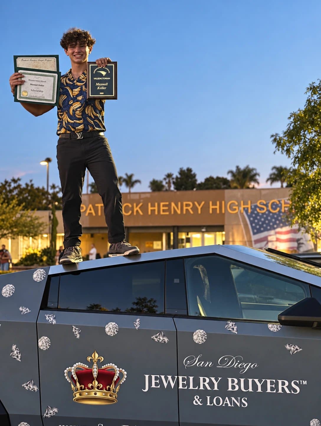 Maxwell Keller standing on the San Diego Jewelry Buyers Cybertruck in front of Patrick Henry High School holding his valedictorian plaque and award certificates